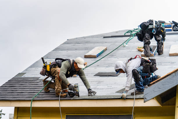 Professional Gutter Installation technician working in Gladstone, MI